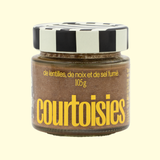 courtoisies de lentilles vertes, noix et de sel fumé